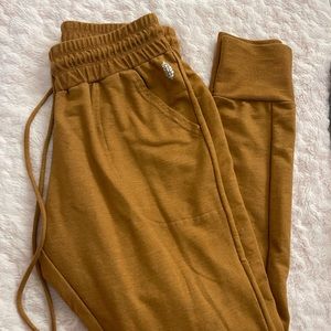 Free People Movement Rust Orange Joggers